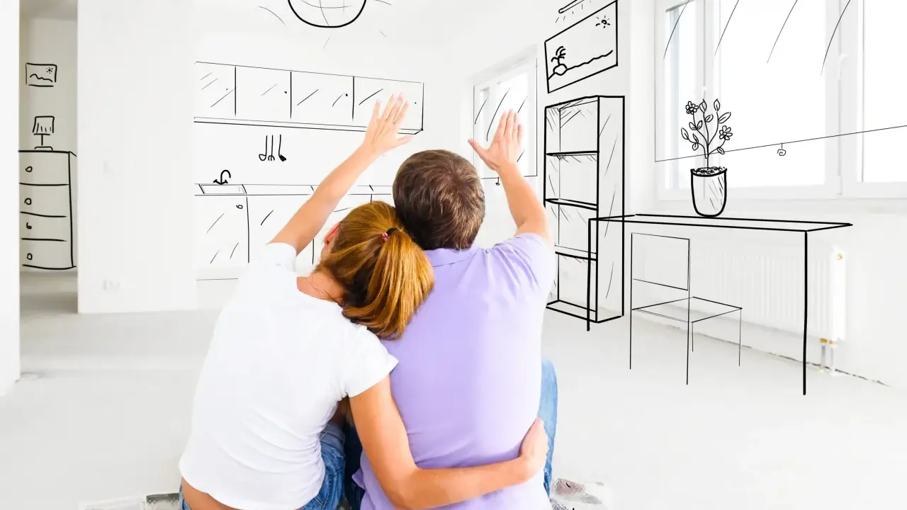 Un couple imagine sa future cuisine, se demandant : faut-il acheter DPE E ?